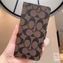 コーチ/Coach iPhone 15/14ケース 手帳型カード挿し込み可能小銭入れ Galaxy携帯に適している優れた耐久性